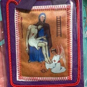 Religious scapular purple benediction and protection.